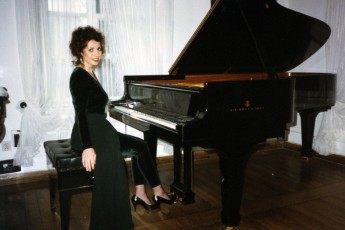 Pianist Catherine Wilson at Frederic Chopin’s Birth House in Zelazola Wola, Poland in 1997.  Her performance of Chopin’s ‘Berceuse’, Op. 57 in D Flat Major was chosen by NY City videographer Peter Rosen as one of five videos to be part of the Series entitled Classical Vignettes. Each of these 5 videos are heard frequently on Classic Arts Showcase, PBS and other networks and platforms world-wide.